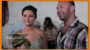 A woman in a sparkly dress and a man in a striped shirt are interviewed at a celebrity event, with logos and a "celebrity gps.com" watermark visible.