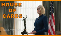 Robin wright stands in the oval office, dressed in a blue suit with "house of cards" text overlaid, in a promotional still for the tv show.