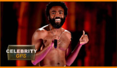 Donald Glover smiling and giving thumbs up.